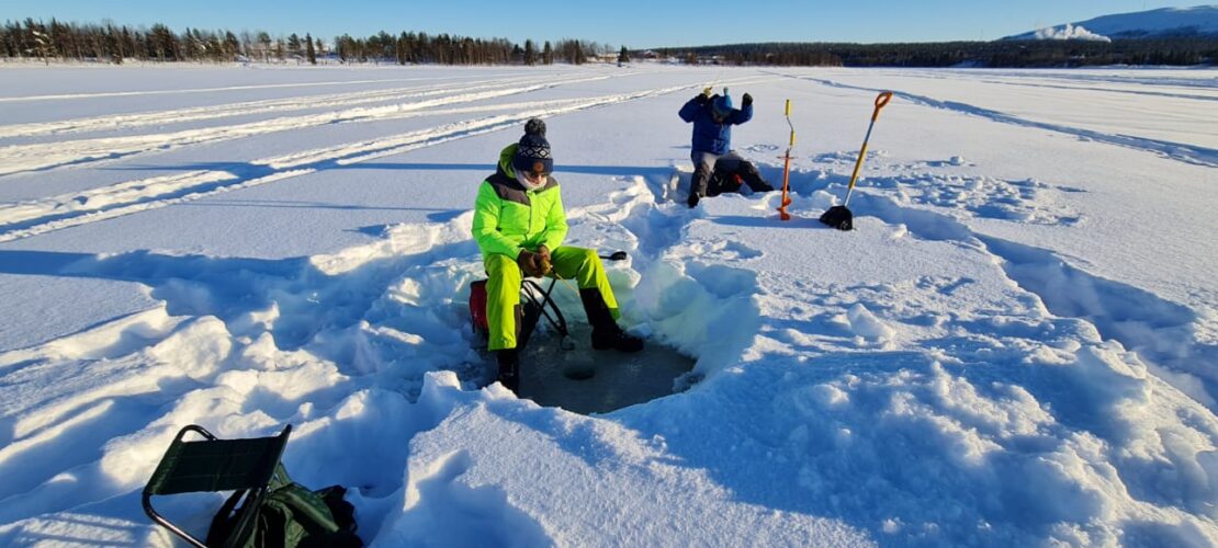 Easy snowmobile safari with ice fishing